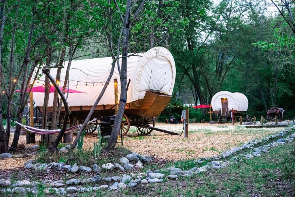 Luxury tent Cozy Wild West Covered Wagon Next To River Grants Pass