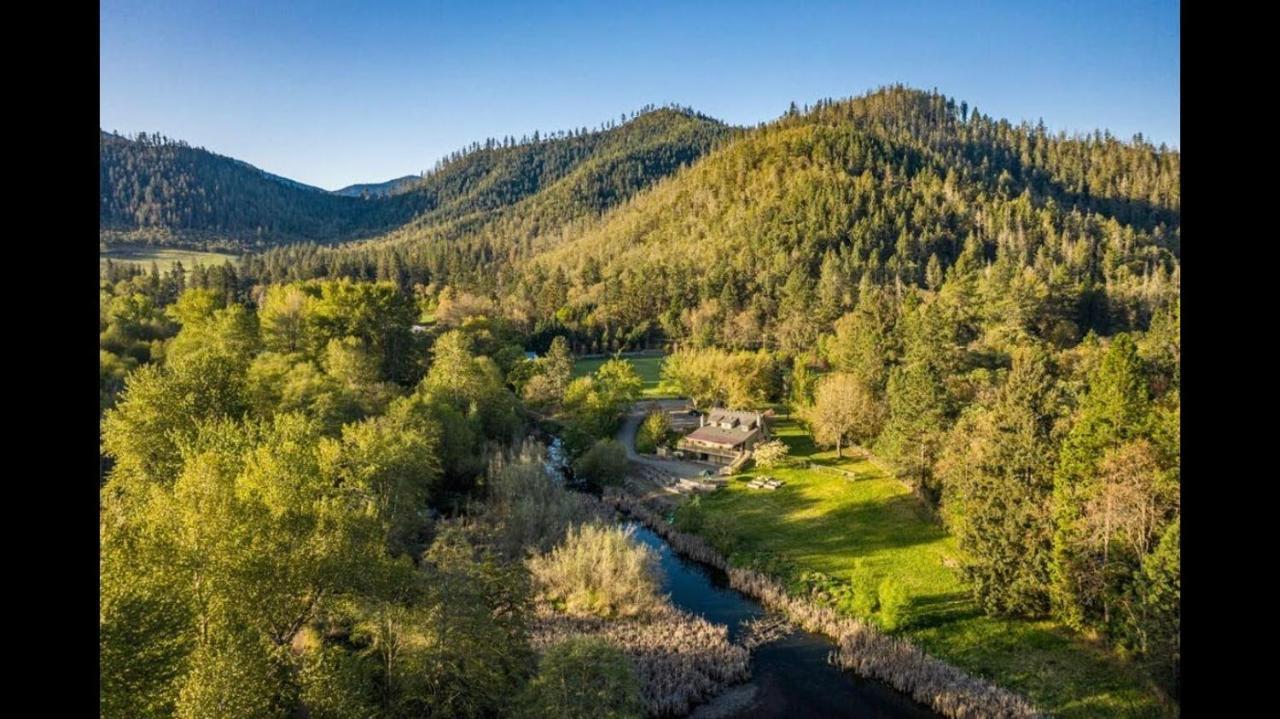Cozy Wild West Covered Wagon Next To River *