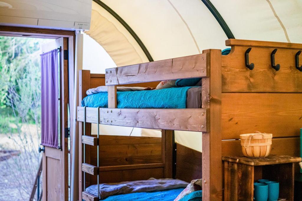 Luxury tent Cozy Wild West Covered Wagon Next To River Grants Pass