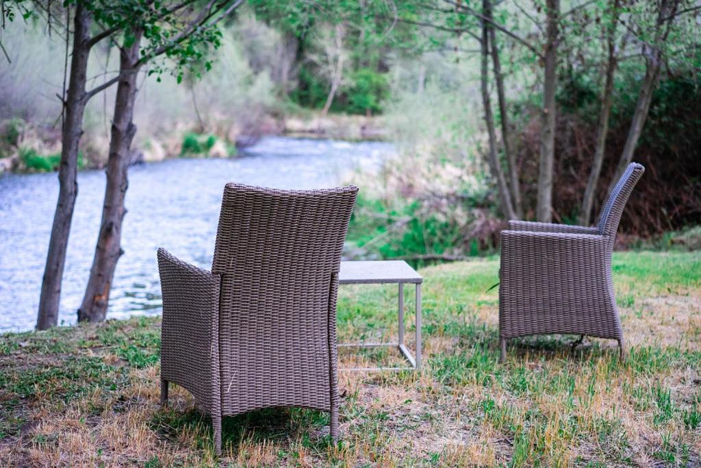 Cozy Wild West Covered Wagon Next To River Glamping